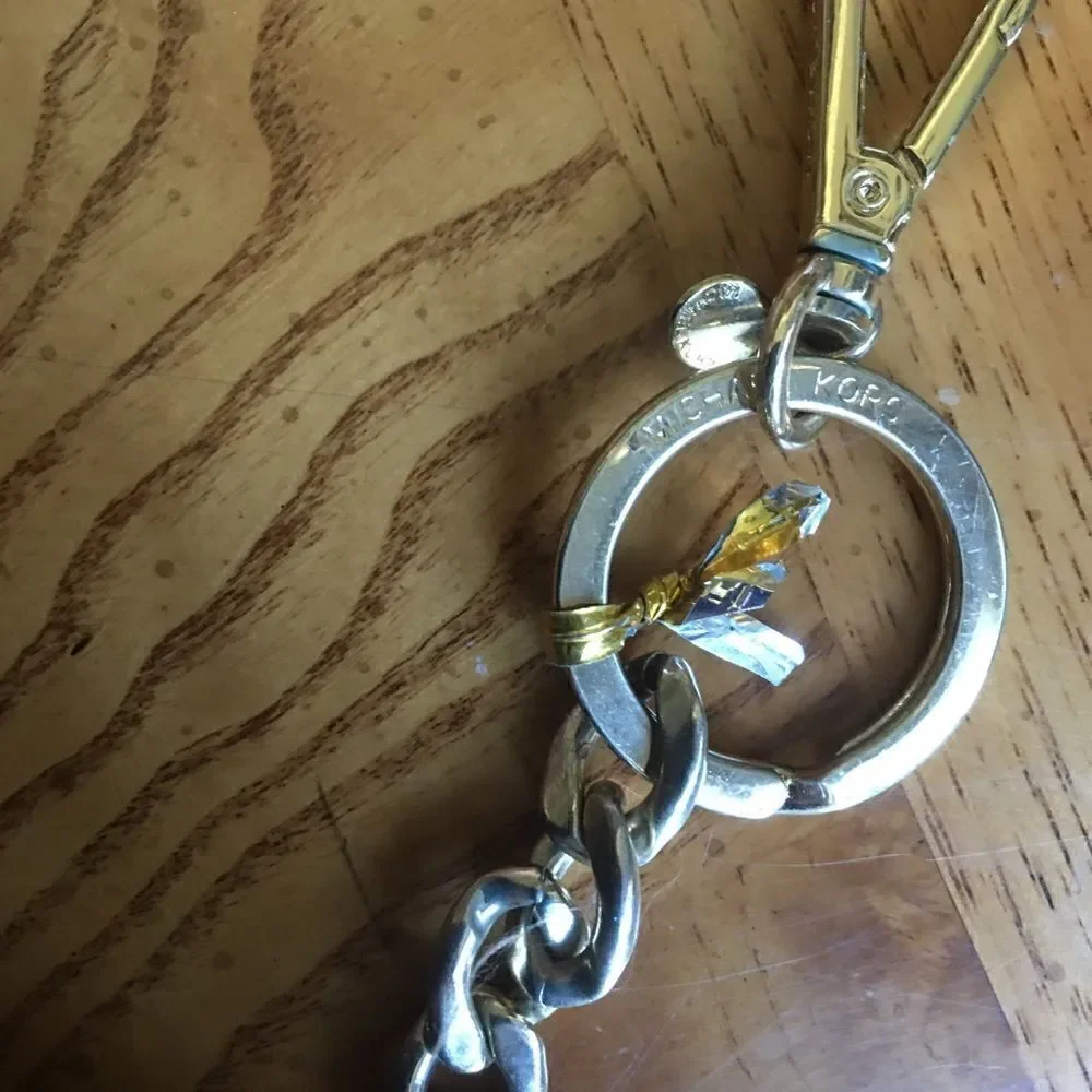 MICHAEL KORS’ Purse or Key Pom Pom Dangle